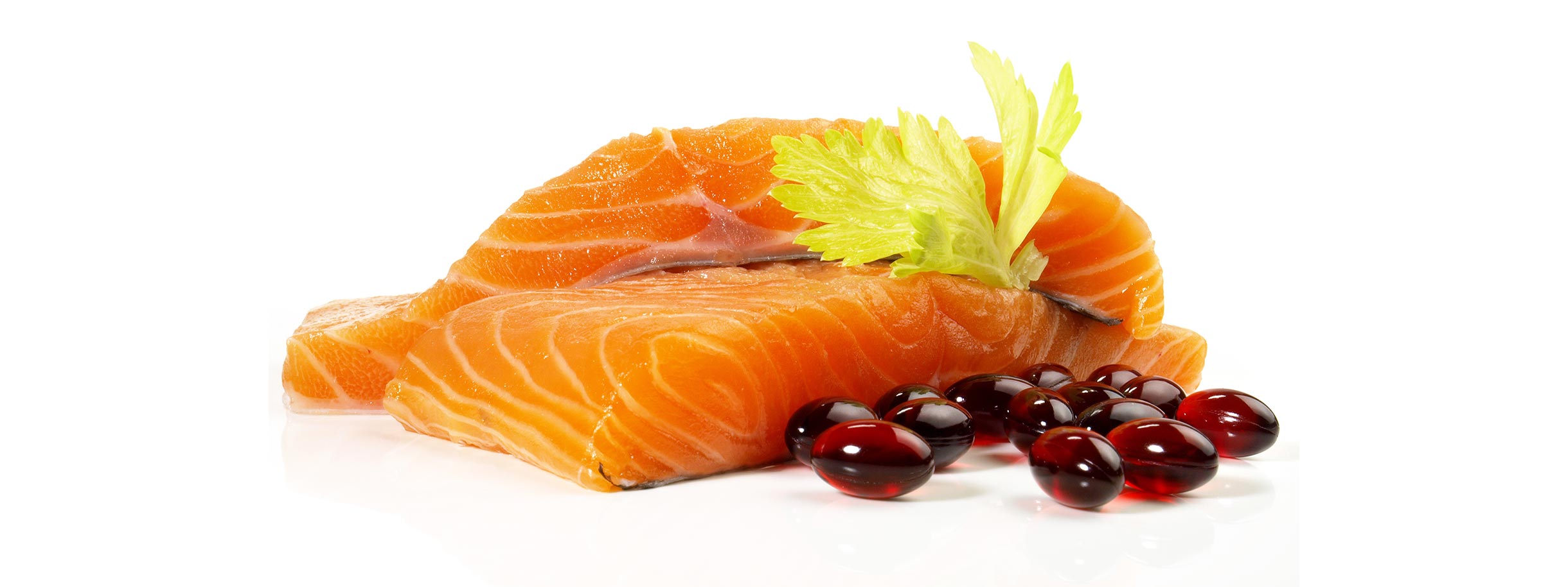 raw salmon filets and Astaxanthin pills 