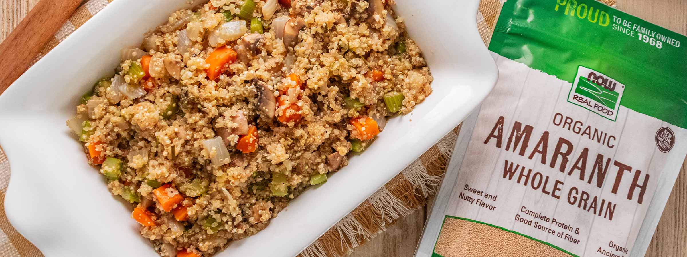 top view of Holiday Amaranth Quinoa Pilaf next to a pouch of NOW Amaranth