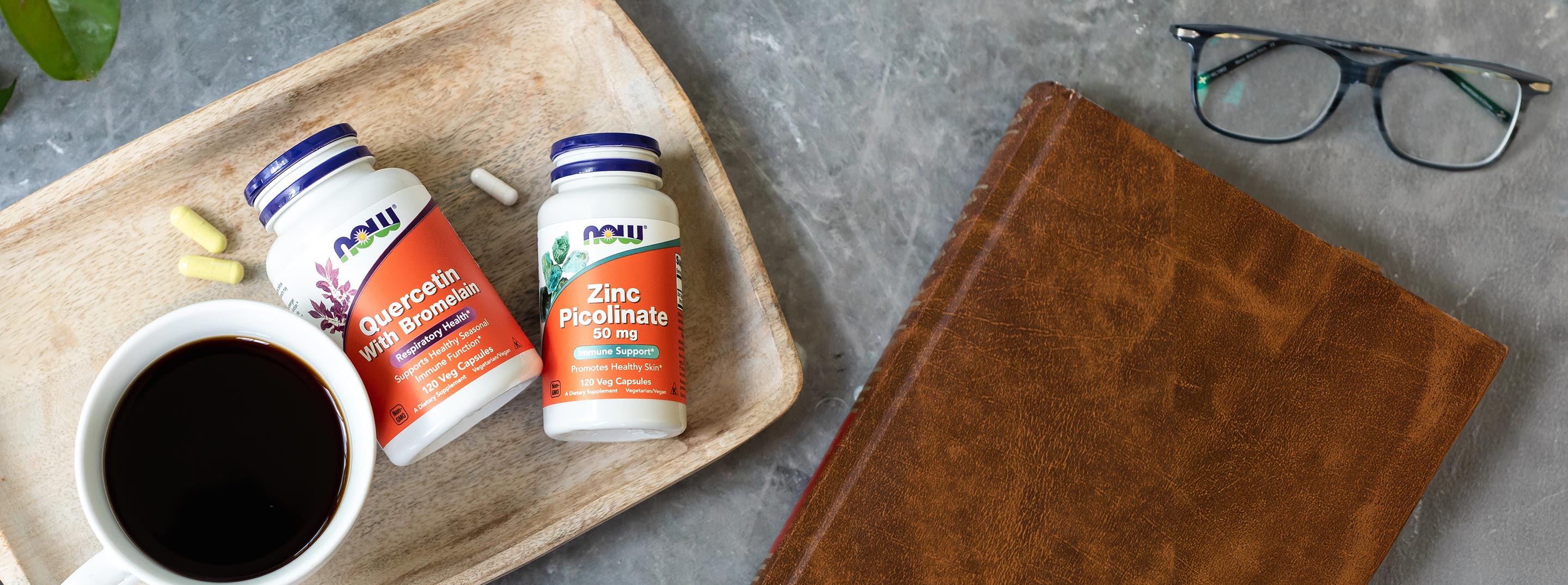 tray with Quercetin with Bromelain and Zinc Picolinate, cup of coffee 