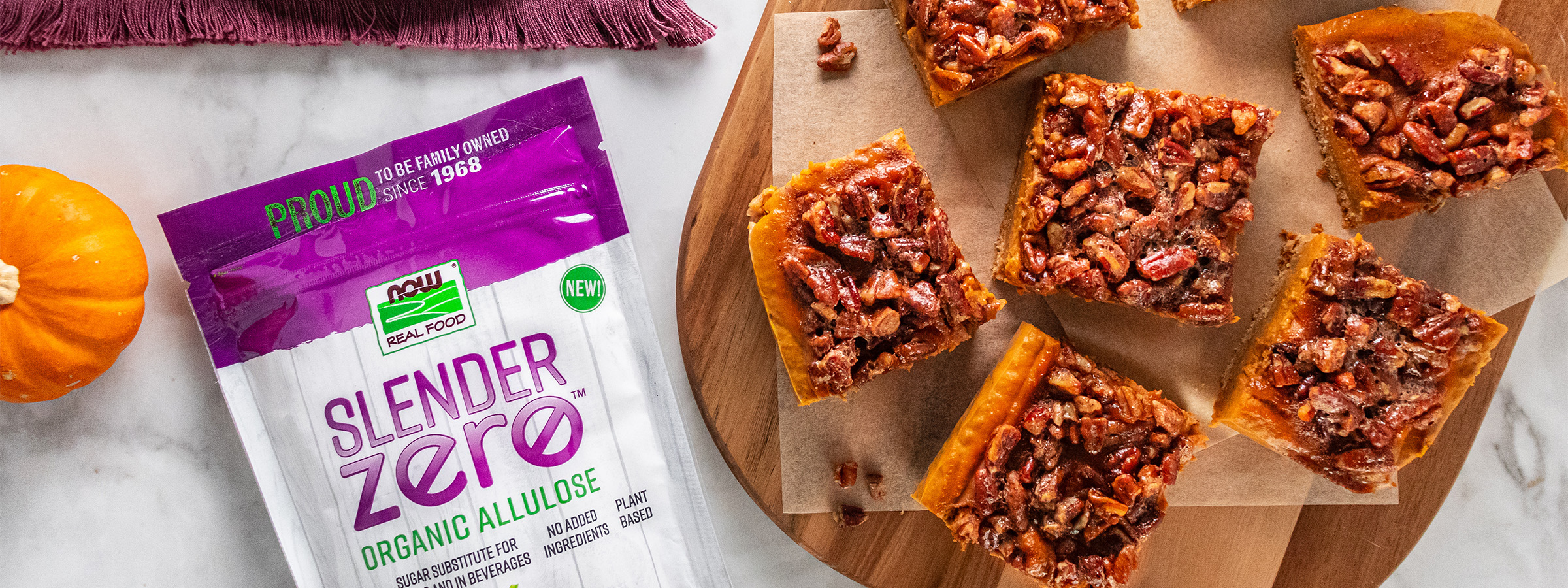 top view of Reduced Sugar Pumpkin Pecan Bars next to bag of NOW Slender Zero