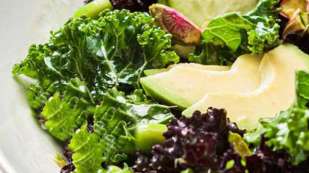 healthy salad, avocado, glass plate