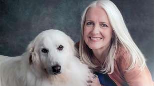 Dr. Royal with her white dog