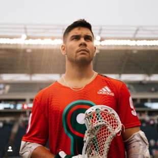 Joe Nardella portrait with lacross stick