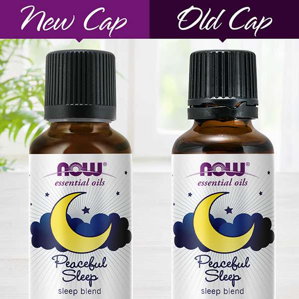 two NOW brand essential oil Peaceful Sleep bottles with different bottle caps on each bottle and the words New Cap at the top left essential oil and Old Cap at the top right essential oil