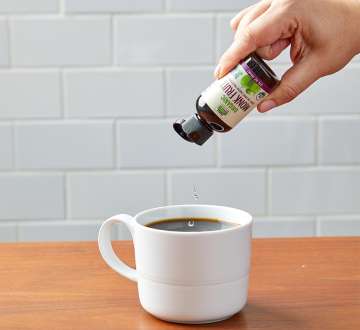 adding a few drops of Monk Fruit Liquid to Coffee