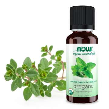NOW Solutions Oregano Oil with oregano leaves behind the bottle