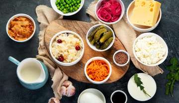 Probiotic foods including; pickles, sauerkraut, kefir, and more