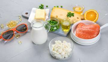 foods representing Calcium: yogurt, cheese, milk, fortified orange juice and soymilk, kale, canned salmon  	Vitamin D: fatty fish, some types of mushrooms, fortified dairy and plant milk