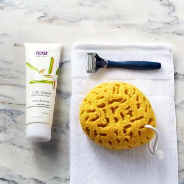 NOW Solutions Nutri-Shave, blue razor and natural sponge