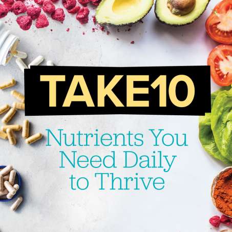 Light gray background with a variety of capsules on the left edge and fruits and vegetables on the top and right edge. It reads take ten nutrients you need daily to thrive