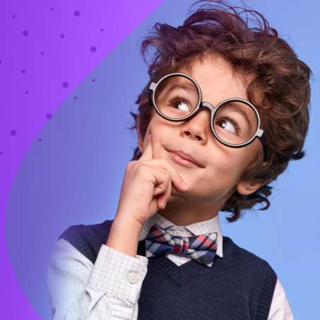 child with glasses looking off to the right finder to chin in a thinking stance.
