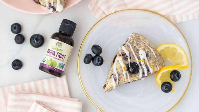 top view of Lemon Poppyseed Scones with bottle of liquid monk fruit next to it