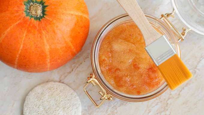 pumpkin with glass jar of pumpkin spice DIY Face Mask 