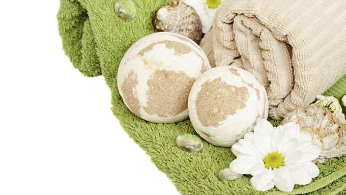 Bath bombs on top of a towel