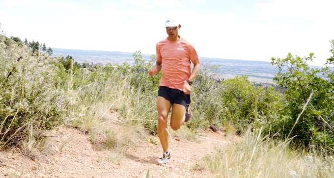 Joseph Gray running up a hill