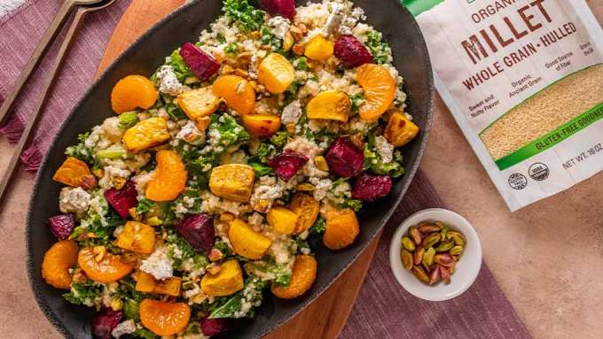top view of Autum Millet Salad next to bag of NOW Millet