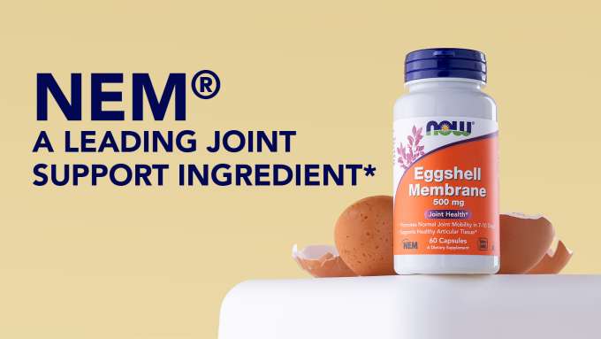 NEM, a leading joint support ingredient, in an Eggshell Membrane bottle on a white table hanging over the edge