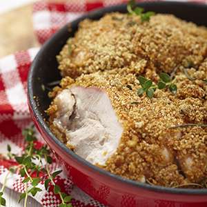A closeup of Gluten Free Walnut-Baked Chicken in a black bowl