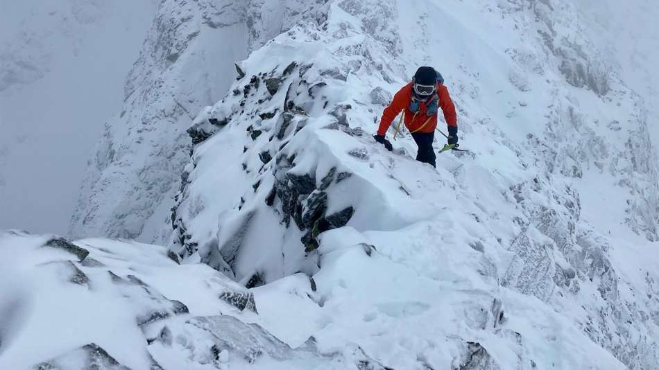 Erin Ton Climbing snow covered mountain