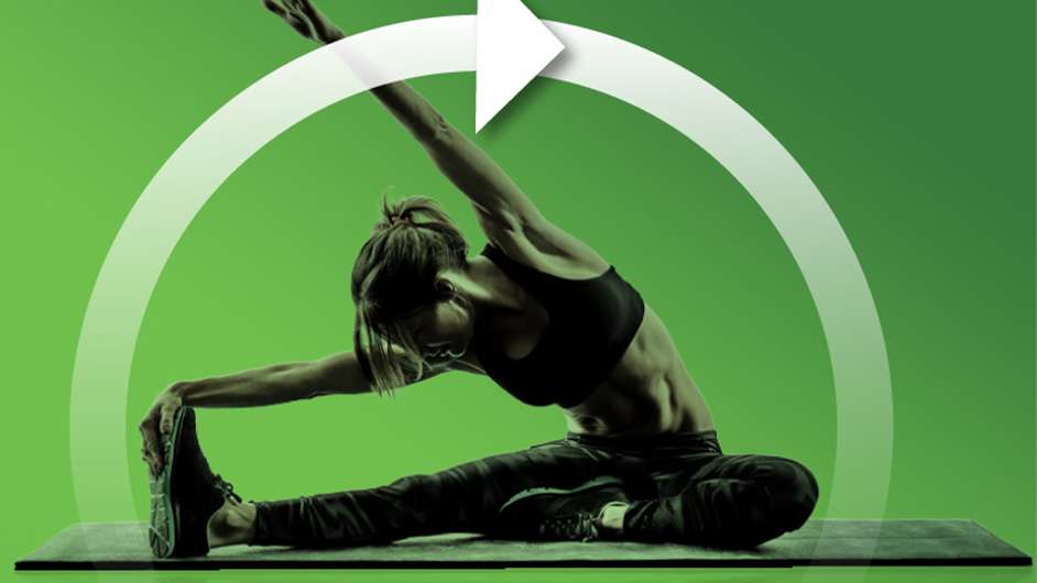 green background with light skin female presenting person stretching on a yoga mat