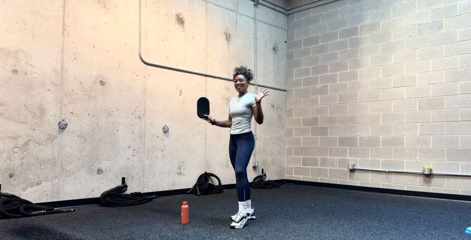 monica jones standing in a gym