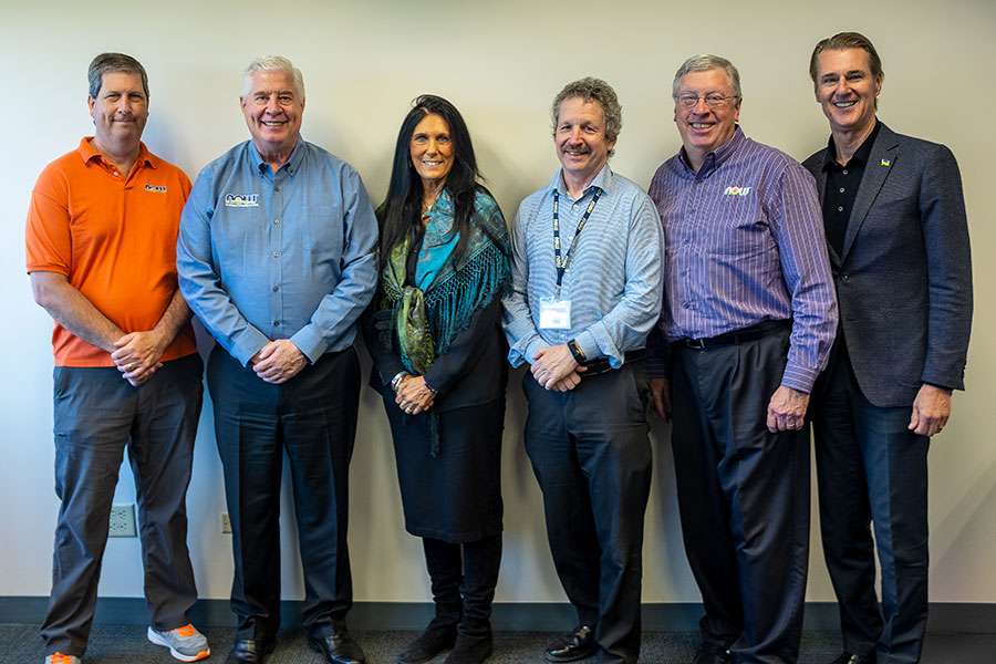 six people on the NOW board of directors, including Dr. Tieraona Low Dog in the middle with two males on her right and three on her left