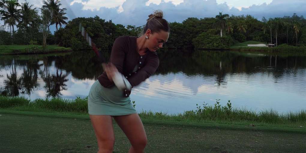 Sydney Grimes mid Golf swing